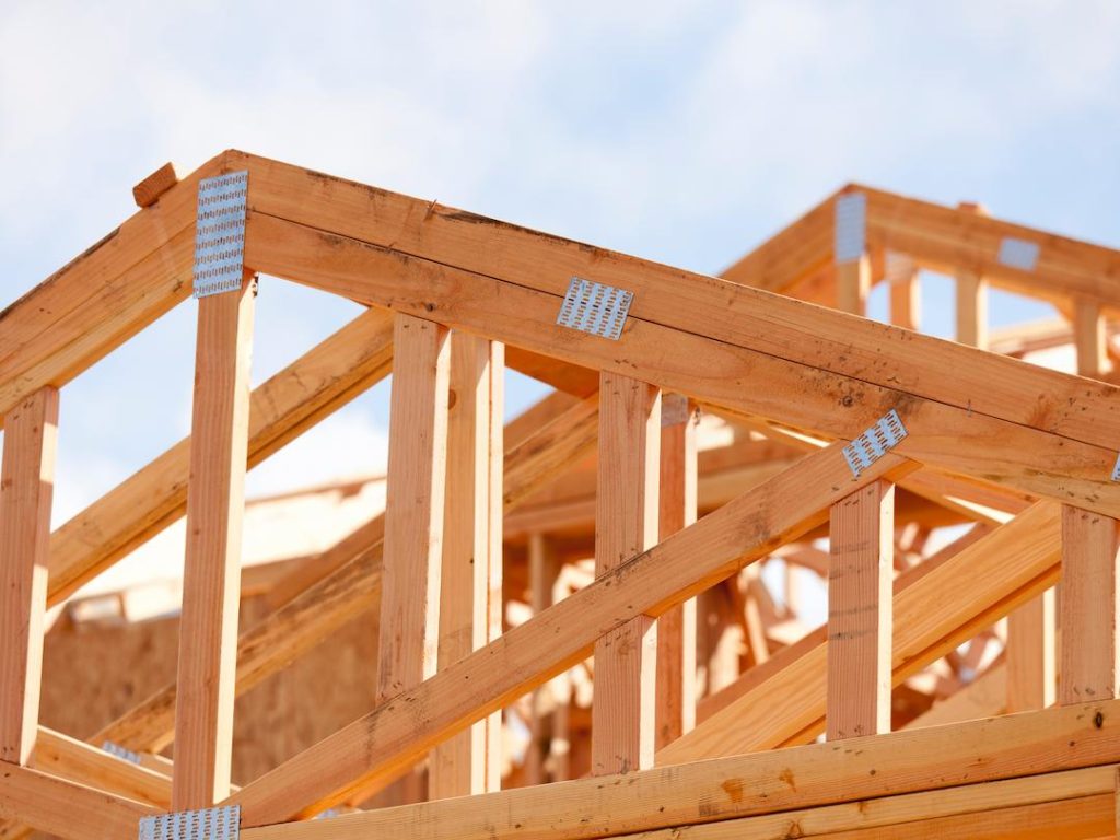 Building Roof With Wooden Trusses